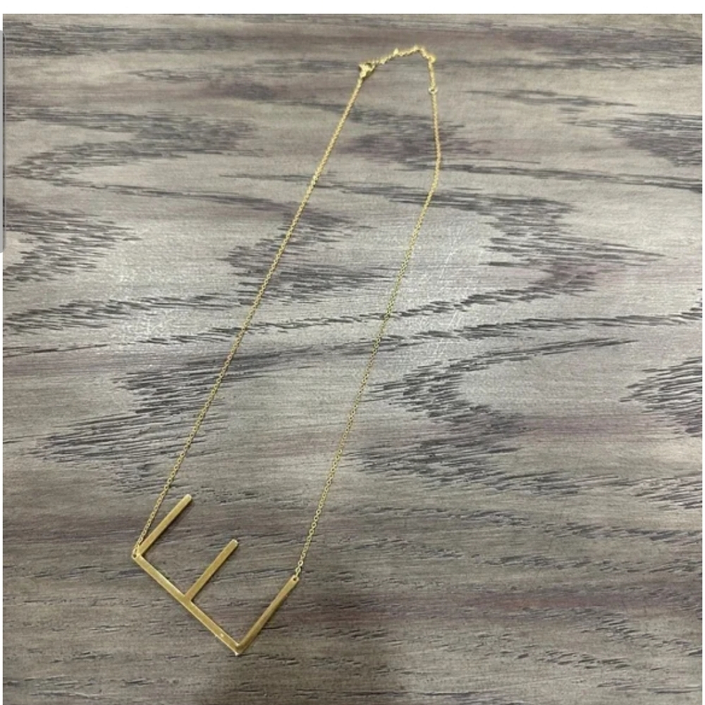 Elegant Gold Tone E Necklace